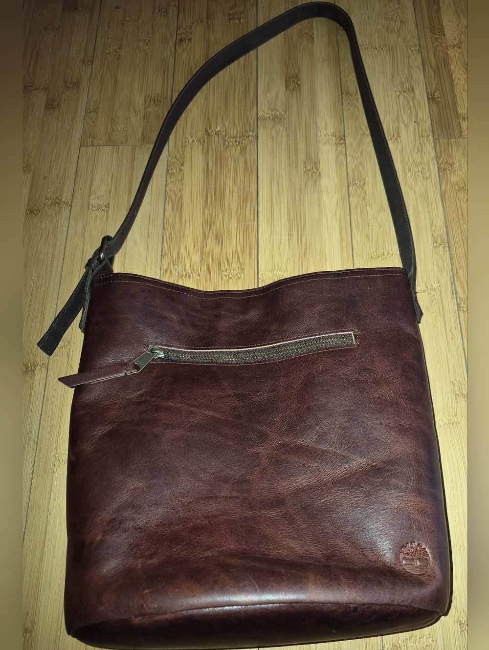 Timberland Brown Leather Bucket bag with an adjustable strap
